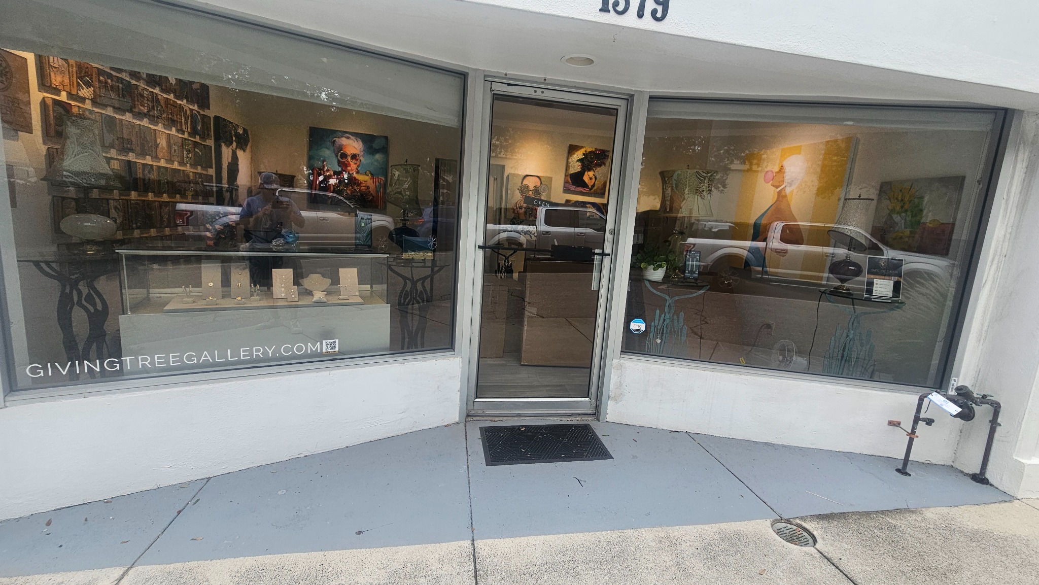 Commercial storefront window cleaning at Giving Tree Gallery in Sarasota