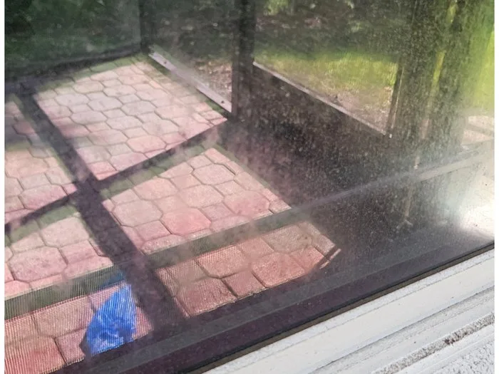 Before screened lanai window cleaning Sarasota, heavy grime buildup